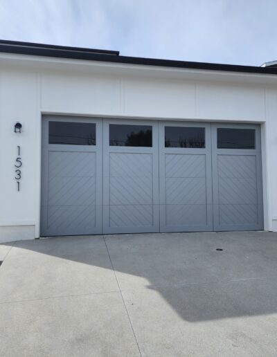 A home with a gray garage door.